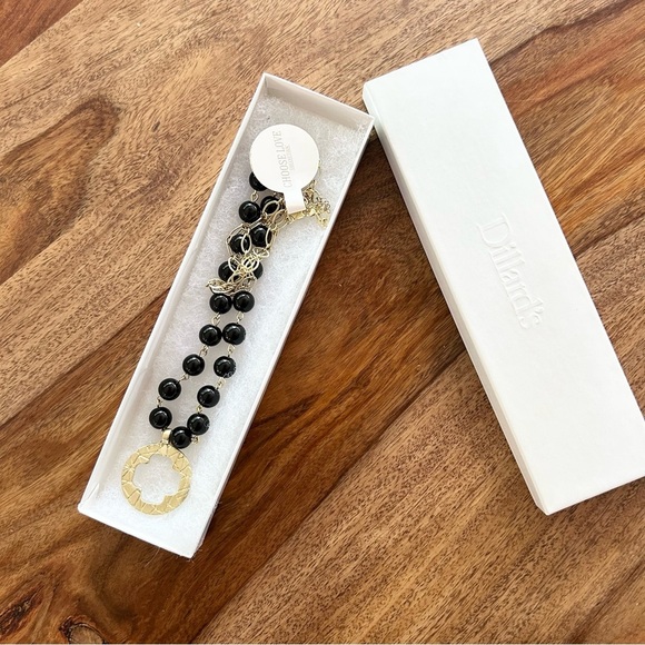 Long cross necklace from Dillard’s - Picture 1 of 6